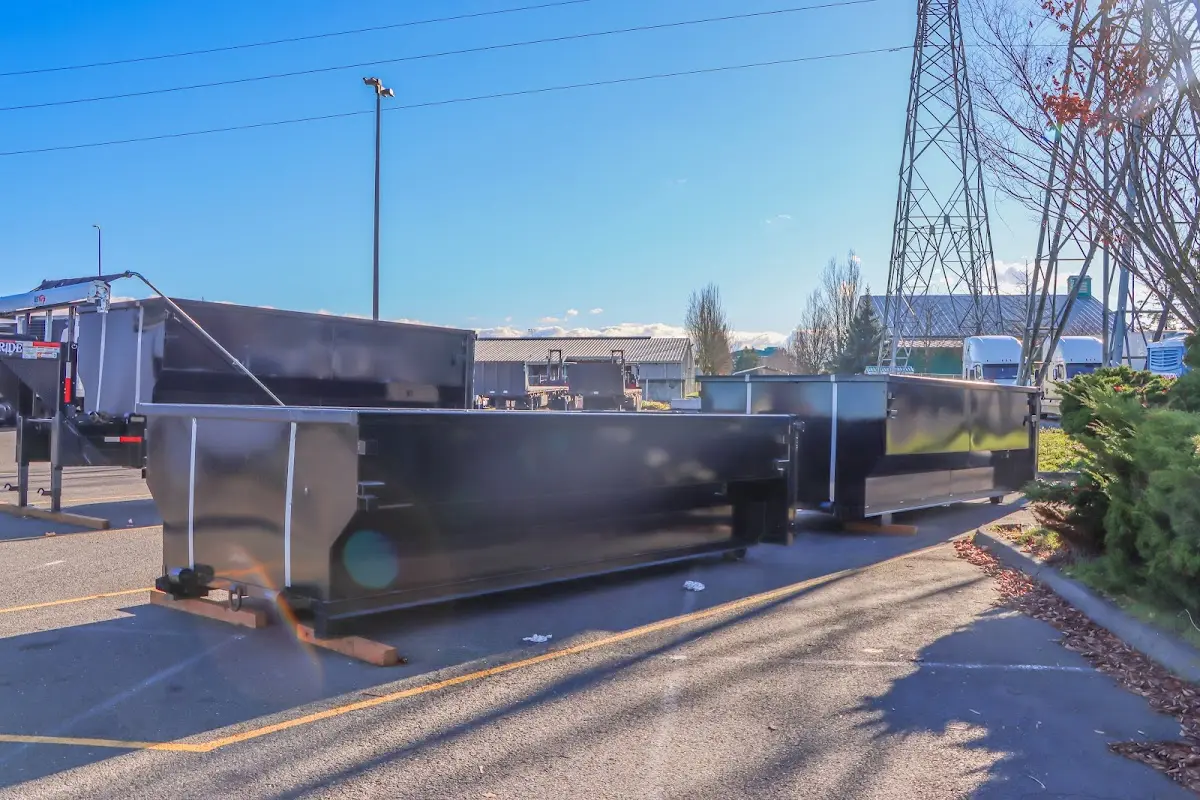 Roll-off dumpster ready for waste disposal at job site for Roll Off Dumpster Rental in Lenox